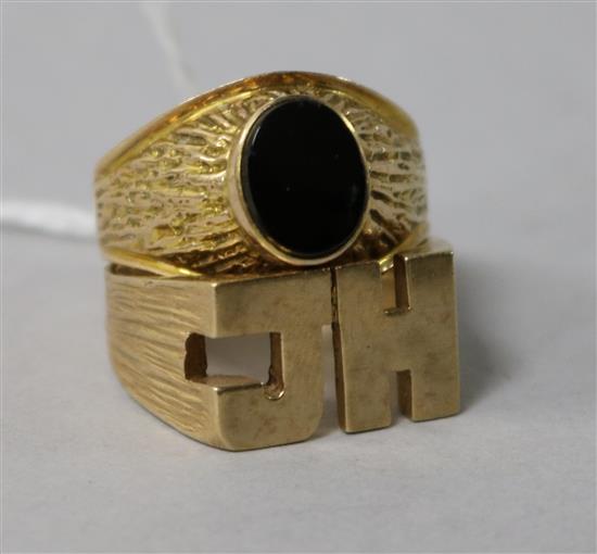 A gentlemans yellow metal and black onyx signet ring (tests as 9ct) and a JH 9ct gold signet ring.